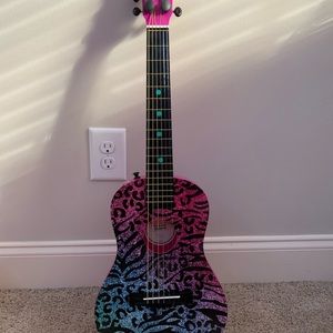 Kid sized toy guitar